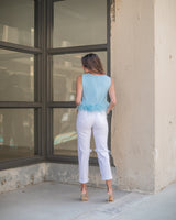 FLIRTY FEATHER TOP- POWDER BLUE